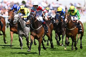 Mokaatil ridden by David Egan (C) on their way to winning on the World Pool