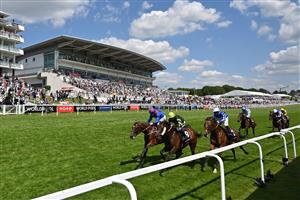 Solent Gateway ridden by Hayley Turner (front R) leads the pack during the World Pool At The Tote Handicap Stakes race on the second day of the Epsom Derby Festival horse racing event at Epsom Downs Racecourse in Surrey, southern England on June 5, 2021. (Photo by Glyn KIRK / AFP) (Photo by GLYN KIRK/AFP via Getty Images)