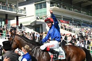 Adam Kirby on Adayar celebrates their winning the Epsom Derby on the second day of the Epsom Derby Festival horse racing event at Epsom Downs Racecourse in Surrey, southern England on June 5, 2021. (Photo by Glyn KIRK / AFP) (Photo by GLYN KIRK/AFP via Getty Images)