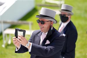 EPSOM, ENGLAND - JUNE 05: Racegoers attend day two of the Cazoo Derby Festival at Epsom Racecourse on June 5, 2021 in Epsom, England. (Photo by John Walton-Pool/Getty Images)