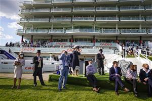 EPSOM, ENGLAND - JUNE 05: A general view as connections watch the race at Epsom Racecourse on June 05, 2021 in Epsom, England. Due to the Coronavirus pandemic, only owners along with a limited number of the paying public will be allowed to attend the meeting. (Photo by Alan Crowhurst/Getty Images)