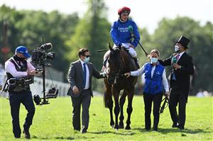 Adam Kirby on Adayar celebrates winning the Derby on the second day of the Epsom Derby Festival horse racing event at Epsom Downs Racecourse in Surrey, southern England on June 5, 2021. (Photo by Glyn KIRK / AFP) (Photo by GLYN KIRK/AFP via Getty Images)