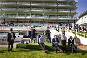EPSOM, ENGLAND - JUNE 05: A general view as connections watch the race at Epsom Racecourse on June 05, 2021 in Epsom, England. Due to the Coronavirus pandemic, only owners along with a limited number of the paying public will be allowed to attend the meeting. (Photo by Alan Crowhurst/Getty Images)