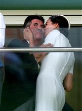 EPSOM, ENGLAND - JUNE 05: Simon Cowell and Lauren Silverman during day two of the Cazoo Derby Festival at Epsom Racecourse on June 5, 2021 in Epsom, England. (Photo by John Walton-Pool/Getty Images)