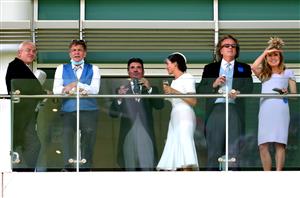 EPSOM, ENGLAND - JUNE 05: Simon Cowell and Lauren Silverman during day two of the Cazoo Derby Festival at Epsom Racecourse on June 5, 2021 in Epsom, England. (Photo by John Walton-Pool/Getty Images)