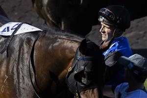 SYDNEY, AUSTRALIA - JUNE 05: Sam Clipperton unsaddles Shadow Crush after winning race 5 the Acy Securities Handicap during Sydney Racing at Rosehill Gardens on June 05, 2021 in Sydney, Australia. (Photo by Jenny Evans/Getty Images)