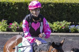 SYDNEY, AUSTRALIA - JUNE 05: Louise Day on Distillate returns to scale after winning race 2 the TAB highway Class 3 handicap during Sydney Racing at Rosehill Gardens on June 05, 2021 in Sydney, Australia. (Photo by Jenny Evans/Getty Images)