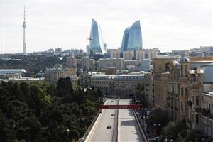 BAKU, AZERBAIJAN - JUNE 06: The Flame Towers are seen as Sergio Perez of Mexico driving the (11) Red Bull Racing RB16B Honda drives on track during the F1 Grand Prix of Azerbaijan at Baku City Circuit on June 06, 2021 in Baku, Azerbaijan. (Getty Images)