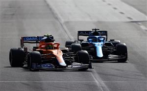 BAKU, AZERBAIJAN - JUNE 06: Lando Norris of Great Britain driving the (4) McLaren F1 Team MCL35M Mercedes and Fernando Alonso of Spain driving the (14) Alpine A521 Renault on track during the F1 Grand Prix of Azerbaijan at Baku City Circuit on June 06, 2021 in Baku, Azerbaijan. (Getty Images)
