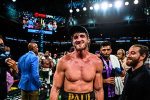 YouTube personality Logan Paul (C) gestures after the fight in an eight-round exhibition bout against Former world welterweight king Floyd Mayweather (off frame) at Hard Rock Stadium in Miami, Florida on June 6, 2021. (Getty Images)