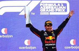 BAKU, AZERBAIJAN - JUNE 06: Race winner Sergio Perez of Mexico and Red Bull Racing celebrates on the podium during the F1 Grand Prix of Azerbaijan at Baku City Circuit on June 06, 2021 in Baku, Azerbaijan. (Getty Images)