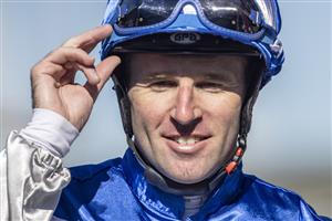 SYDNEY, AUSTRALIA - JUNE 05: Tommy Berry on Cape Breton returns to scale after winning race 1 the Bowermans Commercial Furniture Handicap during Sydney Racing at Rosehill Gardens on June 05, 2021 in Sydney, Australia. (Photo by Jenny Evans/Getty Images)