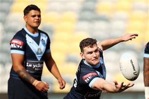 TOWNSVILLE, AUSTRALIA - JUNE 08: Latrell Mitchell watches on as Liam Martin juggles a ball during a New South Wales Blues State of Origin training session at Queensland Country Bank Stadium on June 08, 2021 in Townsville, Australia. (Photo by Mark Kolbe/Getty Images)