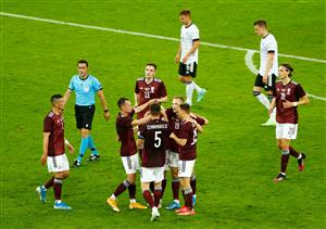 DUESSELDORF, GERMANY - JUNE 07: Aleksejs Saveljevs of Latvia celebrates after scoring their sides first goal with team mates during the international friendly match between Germany and Latvia at Merkur Spiel-Arena on June 07, 2021 in Duesseldorf, Germany. (Getty Images)