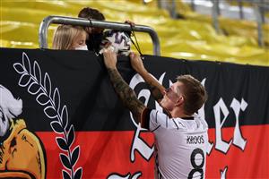 DUESSELDORF, GERMANY - JUNE 07: Toni Kroos of Germany interacts with their family following the international friendly match between Germany and Latvia at Merkur Spiel-Arena on June 07, 2021 in Duesseldorf, Germany. (Getty Images)