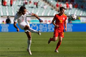 Switzerland's defender Kevin Mbabu (L) crosses the ball as he is marked by Wales' midfielder Daniel James during the UEFA EURO 2020 Group A football match between Wales and Switzerland at the Olympic Stadium in Baku on June 12, 2021. (Getty Images)
