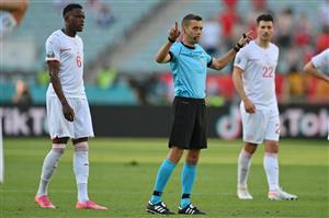 French referee Clement Turpin (C) gestures for VAR after a goal for Switzerland during the UEFA EURO 2020 Group A football match between Wales and Switzerland at the Olympic Stadium in Baku on June 12, 2021. (Getty Images)