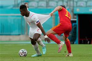 TOPSHOT - Wales' forward Gareth Bale (R) pulls on the shirt of Switzerland's forward Breel Embolo during the UEFA EURO 2020 Group A football match between Wales and Switzerland at the Olympic Stadium in Baku on June 12, 2021. (Getty Images)
