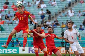 TOPSHOT - Wales' forward Gareth Bale (L) heads the ball away during the UEFA EURO 2020 Group A football match between Wales and Switzerland at the Olympic Stadium in Baku on June 12, 2021. (Getty Images)