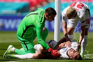 TOPSHOT - England's forward Harry Kane (down) reacts after hitting the post past Croatia's goalkeeper Dominik Livakovic (L) and England's midfielder Phil Foden during the UEFA EURO 2020 Group D football match between England and Croatia at Wembley Stadium in London on June 13, 2021. (Getty Images)