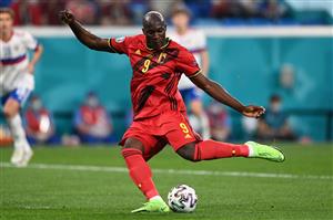 TOPSHOT - Belgium's forward Romelu Lukaku kicks the ball and scores his team's first goal during the UEFA EURO 2020 Group B football match between Belgium and Russia at the Saint Petersburg Stadium in Saint Petersburg on June 12, 2021. (Getty Images)