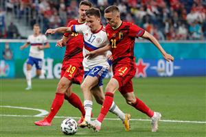 TOPSHOT - Russia's midfielder Aleksandr Golovin (C) fights for the ball with Belgium's midfielder Leander Dendoncker (L) and Belgium's defender Timoty Castagne during the UEFA EURO 2020 Group B football match between Belgium and Russia at the Saint Petersburg Stadium in Saint Petersburg on June 12, 2021. (Getty Images)
