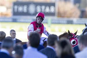 SYDNEY, AUSTRALIA - JUNE 12: Reece Jones on Opacity returns to scale after winning race 6 the Heineken Racing To Win Handicap during Sydney Racing at Royal Randwick Racecourse on June 12, 2021 in Sydney, Australia. (Photo by Jenny Evans/Getty Images)