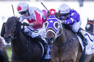 SYDNEY, AUSTRALIA - JUNE 12: Reece Jones (purple) on New Arrangement wins race 8 the Acy Securities Handicap during Sydney Racing at Royal Randwick Racecourse on June 12, 2021 in Sydney, Australia. (Photo by Jenny Evans/Getty Images)
