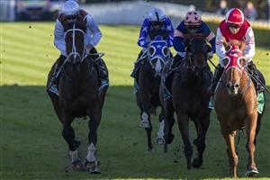 SYDNEY, AUSTRALIA - JUNE 12: Reece Jones (red and white cap) on Opacity wins race 6 the Heineken Racing To Win Handicap during Sydney Racing at Royal Randwick Racecourse on June 12, 2021 in Sydney, Australia. (Photo by Jenny Evans/Getty Images)