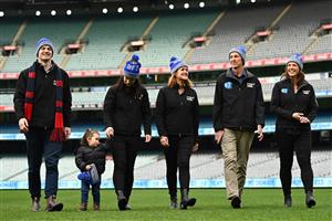 MELBOURNE, AUSTRALIA - JUNE 14: (L-R) Ben Daniher, Rosie McKenna, Lauren Daniher, Jan Daniher, Neale Daniher and Bec Daniher during the Big Freeze slide at Melbourne Cricket Ground on June 14, 2021 in Melbourne, Australia. The annual event aims to raise funds to fight MND as part of the Queen's Birthday AFL match, this year held at the SCG due to Covid19 protocols in Melbourne preventing crowd from attending this year's event. (Photo by Quinn Rooney/Getty Images)
