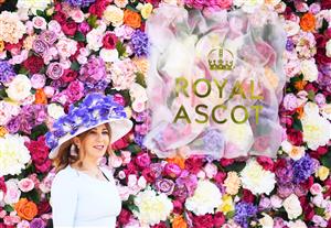 ASCOT, ENGLAND - JUNE 15: A racegoer poses for a photo on Day One of the Royol Ascot Meeting at Ascot Racecourse on June 15, 2021 in Ascot, England. A total of twelve thousand racegoers made up of Owners and the Public are permitted to attend the meeting due to it being an Events Research Programme (ERP) set up by the government due to the Coronavirus Pandemic. (Photo by Harry Trump/Getty Images)