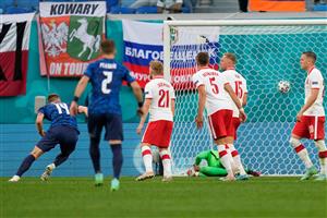 Slovakia's defender Milan Skriniar (L) scores his team's second goal during the UEFA EURO 2020 Group E football match between Poland and Slovakia at the Saint Petersburg Stadium in Saint Petersburg on June 14, 2021. (Getty Images)
