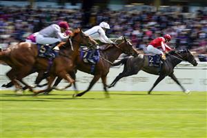 ASCOT, ENGLAND - JUNE 15: Oisin Murphy riding Berkshire Shadow (R) win The Coventry Stakes on day one of the Royal Ascot meeting at Ascot Racecourse on June 15, 2021 in Ascot, England. A total of twelve thousand racegoers made up of owners and the public are permitted to attend the meeting due to it being an Events Research Programme (ERP) set up by the Government due to the Coronavirus pandemic. (Photo by Alan Crowhurst/Getty Images)