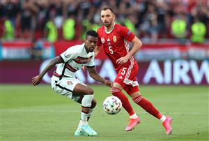 BUDAPEST, HUNGARY - JUNE 15: Nelson Semedo of Portugal battles for possession with Attila Fiola of Hungary during the UEFA Euro 2020 Championship Group F match between Hungary and Portugal at Puskas Arena on June 15, 2021 in Budapest, Hungary. (Getty Images)