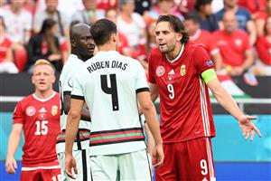 Hungary's forward Adam Szalai (R) remonstrates with Portugal's defender Ruben Dias during the UEFA EURO 2020 Group F football match between Hungary and Portugal at the Puskas Arena in Budapest on June 15, 2021. (Getty Images)