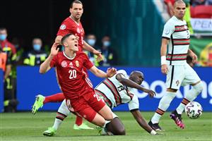 Hungary's forward Roland Sallai (L) vis with Portugal's midfielder Danilo Pereira during the UEFA EURO 2020 Group F football match between Hungary and Portugal at the Puskas Arena in Budapest on June 15, 2021. (Getty Images)