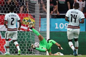 Portugal's goalkeeper Rui Patricio (C) concedes a goal that was later ruled offisde during the UEFA EURO 2020 Group F football match between Hungary and Portugal at the Puskas Arena in Budapest on June 15, 2021. (Getty Images)