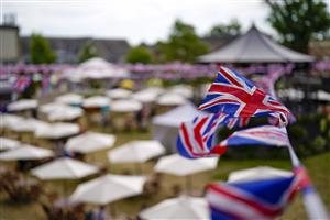 ASCOT, ENGLAND - JUNE 16: A general view of the bandstand and lawn area at Ascot Racecourse on June 16, 2021 in Ascot, England. A total of twelve thousand racegoers made up of owners and the public are permitted to attend the meeting due to it being an Events Research Programme (ERP) set up by the Government due to the Coronavirus pandemic. (Photo by Alan Crowhurst/Getty Images)