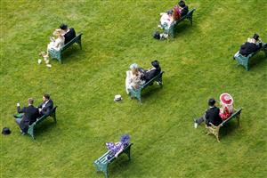ASCOT, ENGLAND - JUNE 16: A general view of racegoers on the Royal Enclosure Lawn on Day Two of the Royal Ascot Meeting at Ascot Racecourse on June 16, 2021 in Ascot, England. A total of twelve thousand racegoers made up of owners and the public are permitted to attend the meeting due to it being an Events Research Programme (ERP) set up by the Government due to the Coronavirus pandemic. (Photo by Alan Crowhurst/Getty Images)