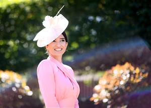 ASCOT, ENGLAND - JUNE 16: A racegoer poses for a photo on Day Two of the Royal Ascot Meeting at Ascot Racecourse on June 16, 2021 in Ascot, England. A total of twelve thousand racegoers made up of Owners and the Public are permitted to attend the meeting due to it being an Events Research Programme (ERP) set up by the government due to the Coronavirus Pandemic. (Photo by Harry Trump/Getty Images)