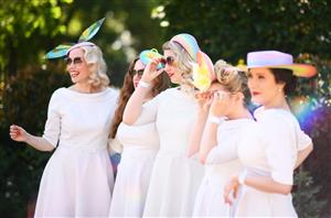 ASCOT, ENGLAND - JUNE 16: Racegoers pose for a photo on Day Two of the Royal Ascot Meeting at Ascot Racecourse on June 16, 2021 in Ascot, England. A total of twelve thousand racegoers made up of Owners and the Public are permitted to attend the meeting due to it being an Events Research Programme (ERP) set up by the government due to the Coronavirus Pandemic. (Photo by Harry Trump/Getty Images)