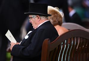 ASCOT, ENGLAND - JUNE 16: A racegoer looks on on Day Two of the Royal Ascot Meeting at Ascot Racecourse on June 16, 2021 in Ascot, England. A total of twelve thousand racegoers made up of Owners and the Public are permitted to attend the meeting due to it being an Events Research Programme (ERP) set up by the government due to the Coronavirus Pandemic. (Photo by Harry Trump/Getty Images)