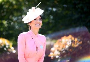 ASCOT, ENGLAND - JUNE 16: A racegoer poses for a photo on Day Two of the Royal Ascot Meeting at Ascot Racecourse on June 16, 2021 in Ascot, England. A total of twelve thousand racegoers made up of Owners and the Public are permitted to attend the meeting due to it being an Events Research Programme (ERP) set up by the government due to the Coronavirus Pandemic. (Photo by Harry Trump/Getty Images)