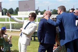 ASCOT, ENGLAND - JUNE 15: Guests seen taking a selfie during Royal Ascot 2021 at Ascot Racecourse on June 15, 2021 in Ascot, England. (Photo by Antony Jones/Getty Images for Royal Ascot)
