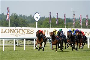 ASCOT, ENGLAND - JUNE 15: Andrea Atzeni riding Juan Elcano (L, yellow) win The Wolferton Stakes on day one of the Royal Ascot meeting at Ascot Racecourse on June 15, 2021 in Ascot, England. A total of twelve thousand racegoers made up of owners and the public are permitted to attend the meeting due to it being an Events Research Programme (ERP) set up by the Government due to the Coronavirus pandemic. (Photo by Alan Crowhurst/Getty Images)