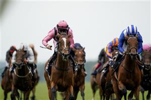 ASCOT, ENGLAND - JUNE 17: Robert Havlin riding Loving Dream (L, pink) win The Ribblesdale Stakes on Day Three of the Royal Ascot Meeting at Ascot Racecourse on June 17, 2021 in Ascot, England. A total of twelve thousand racegoers made up of owners and the public are permitted to attend the meeting due to it being an Events Research Programme (ERP) set up by the Government due to the Coronavirus pandemic. (Photo by Alan Crowhurst/Getty Images)