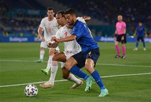 ROME, ITALY - JUNE 16: Kevin Mbabu of Switzerland battles for possession with Leonardo Spinazzola of Italy during the UEFA Euro 2020 Championship Group A match between Italy and Switzerland at Olimpico Stadium on June 16, 2021 in Rome, Italy. (Getty Images)