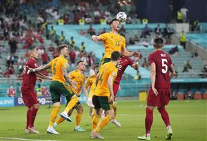 BAKU, AZERBAIJAN - JUNE 16: Kieffer Moore of Wales wins a header whilst under pressure from Kaan Ayhan of Turkey during the UEFA Euro 2020 Championship Group A match between Turkey and Wales at Baku Olimpiya Stadionu on June 16, 2021 in Baku, Azerbaijan. (Getty Images)