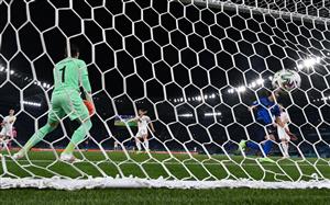 Italy's midfielder Manuel Locatelli (2R) celebrates scoring the team's first goal during the UEFA EURO 2020 Group A football match between Italy and Switzerland at the Olympic Stadium in Rome on June 16, 2021. (Getty Images)
