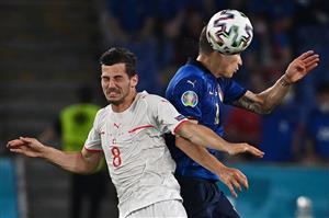 Switzerland's midfielder Remo Freuler (L) vies for the header with Italy's midfielder Nicolo Barella during the UEFA EURO 2020 Group A football match between Italy and Switzerland at the Olympic Stadium in Rome on June 16, 2021. (Getty Images)